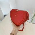 Fashion Heart-Shaped Candy Color Crossbody Sling Bag – PU Leather Zipper Bag for Girls